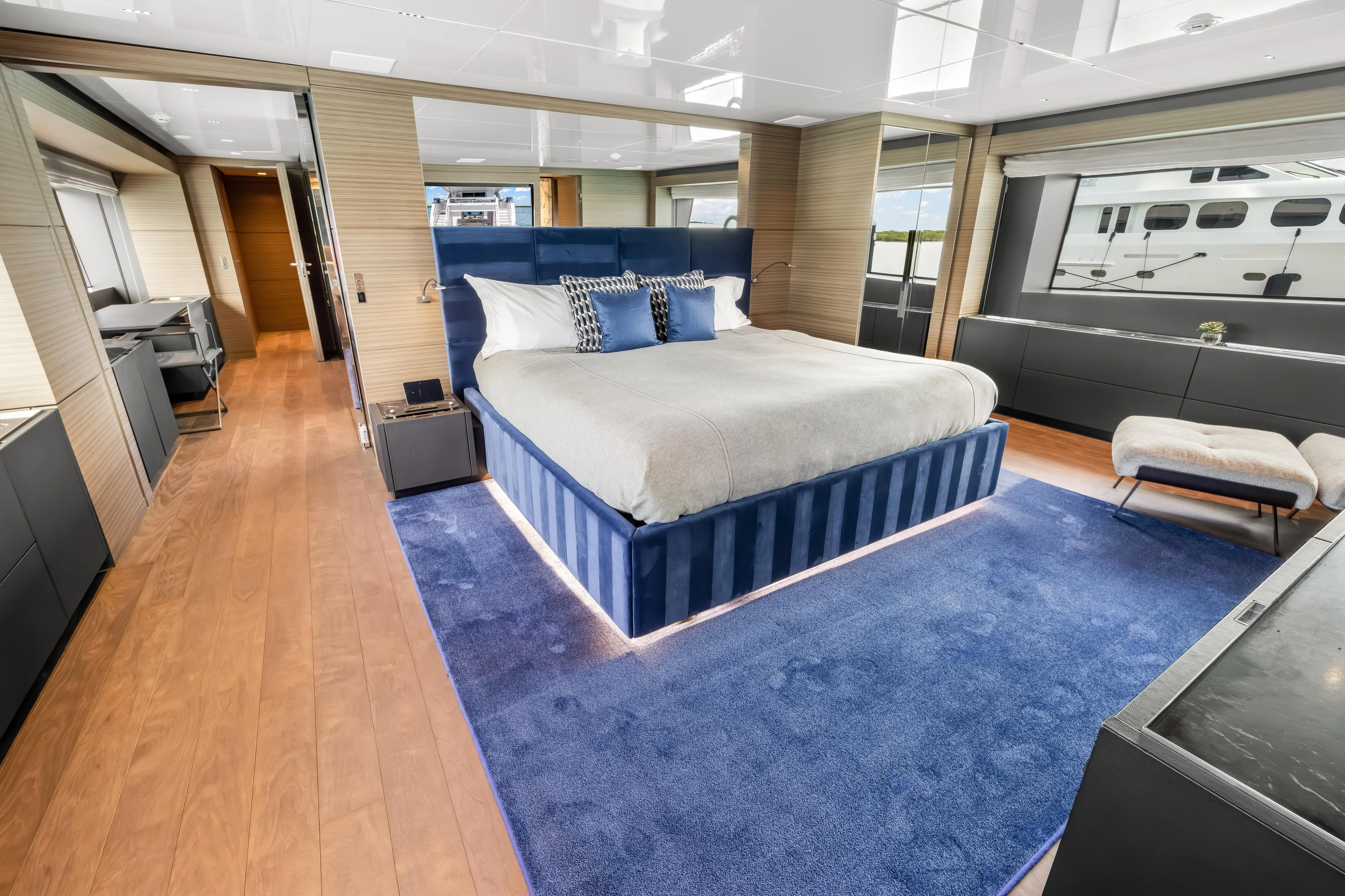 Navetta Yacht Photos Pics Luxurious 2023 Custom Line NAVETTA 42 yacht bedroom with modern design and elegant furnishings.