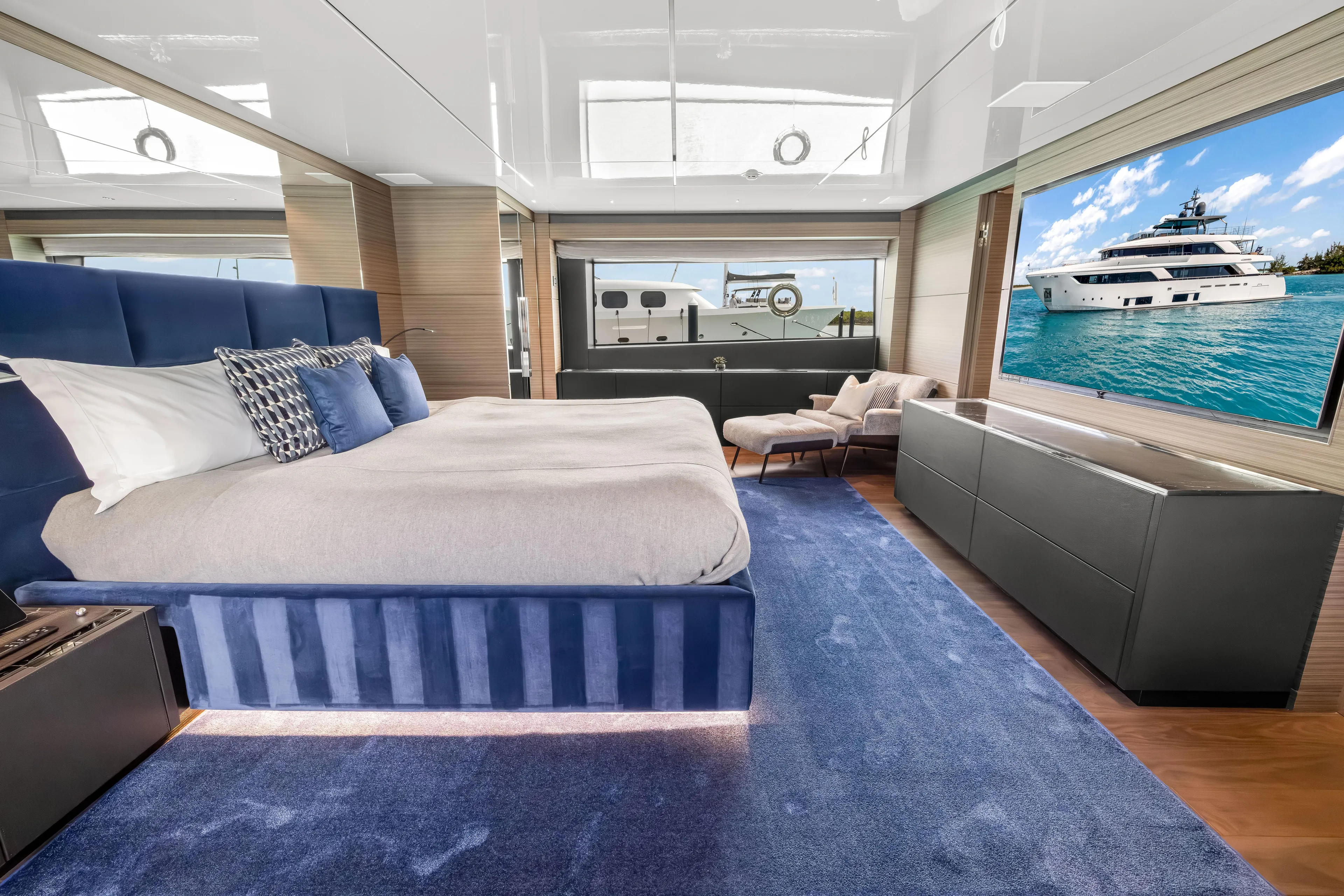 Navetta Yacht Photos Pics Luxurious bedroom interior on 2023 Custom Line NAVETTA 42 yacht with ocean view.