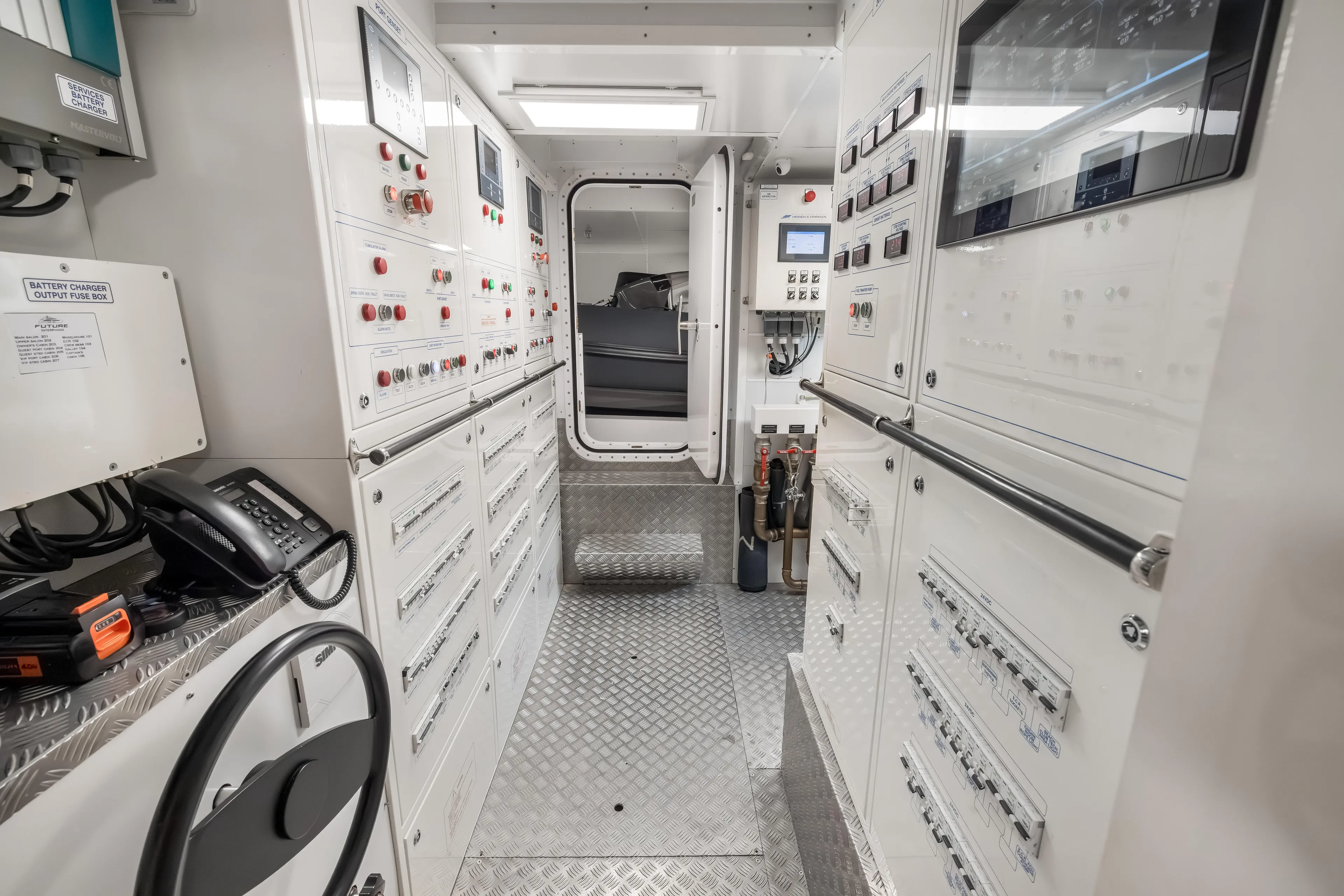 Navetta Yacht Photos Pics Control room of 2023 Custom Line NAVETTA 42 yacht, featuring advanced navigation and communication systems.