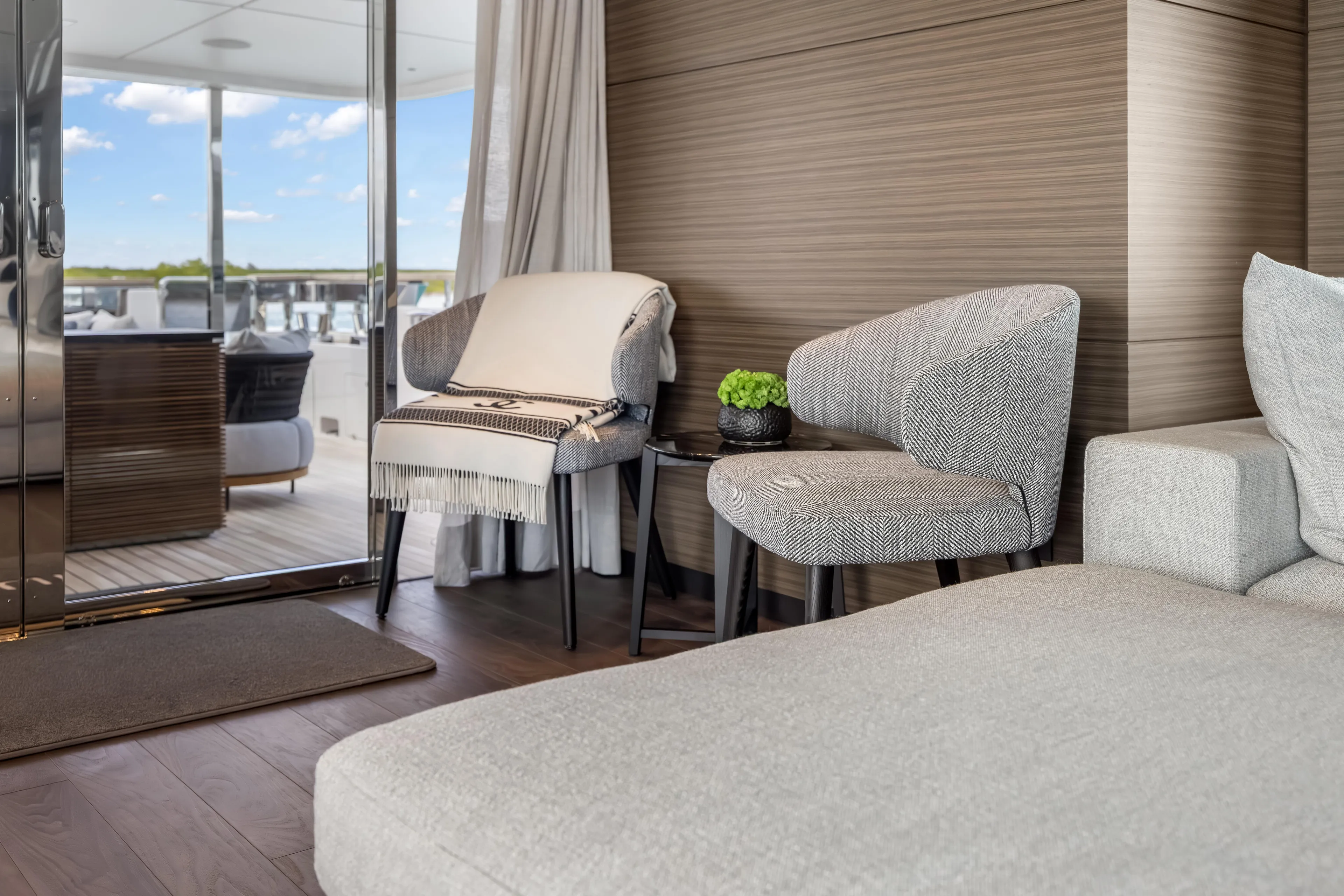 Navetta Yacht Photos Pics Luxurious interior of 2023 Custom Line NAVETTA 42 yacht with elegant seating and decor.