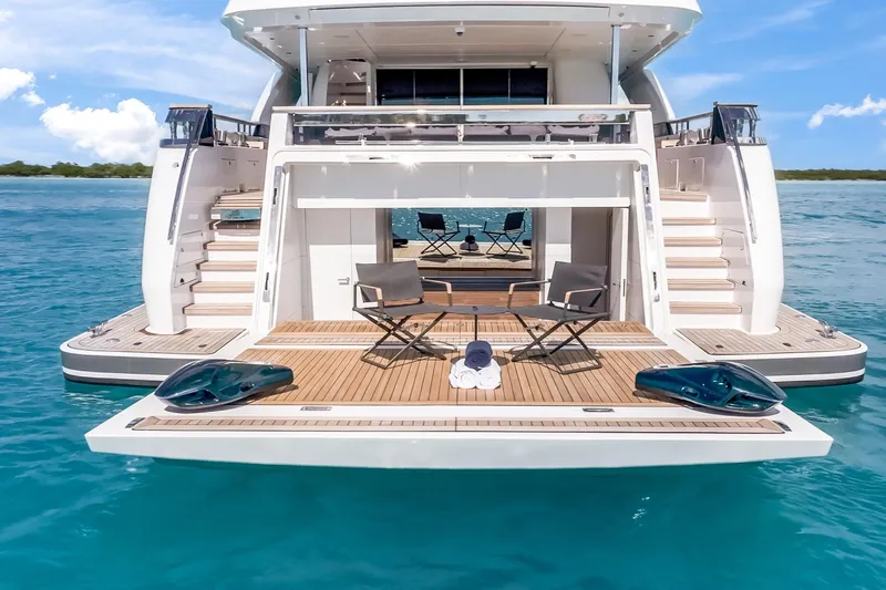 Navetta Yacht Photos Pics Luxury yacht Custom Line NAVETTA 42, 2023 model, with elegant deck and ocean view.