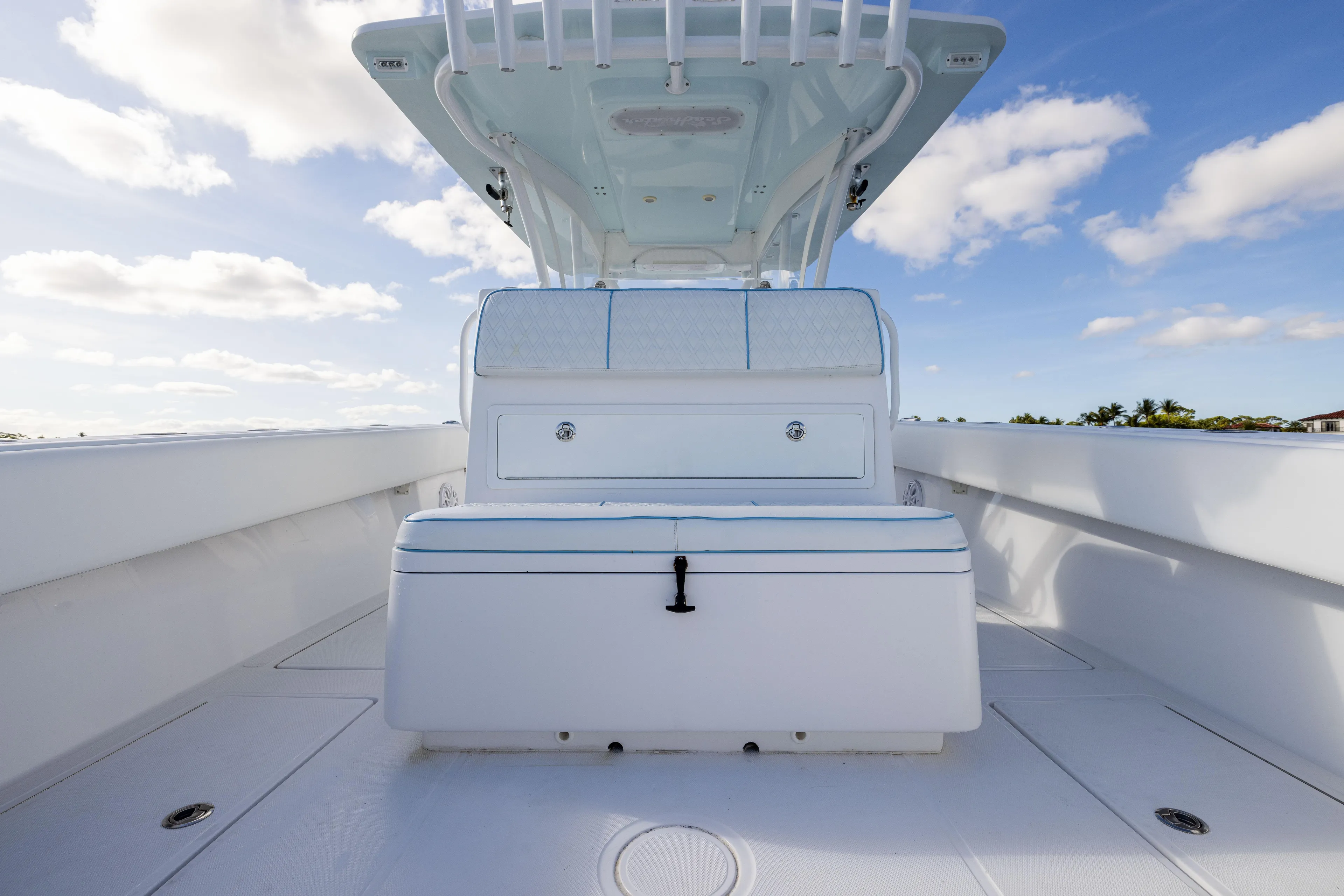 Bloodline Yacht Photos Pics 2018 SeaHunter 33' Center Console boat, spacious deck under clear blue sky.