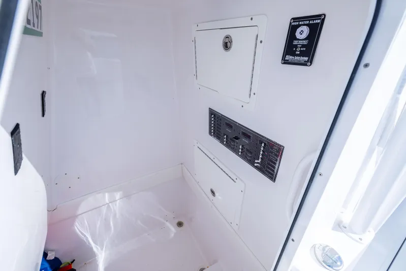 Bloodline Yacht Photos Pics Interior of 2018 SeaHunter 33' Center Console boat, featuring storage compartments and sleek design.