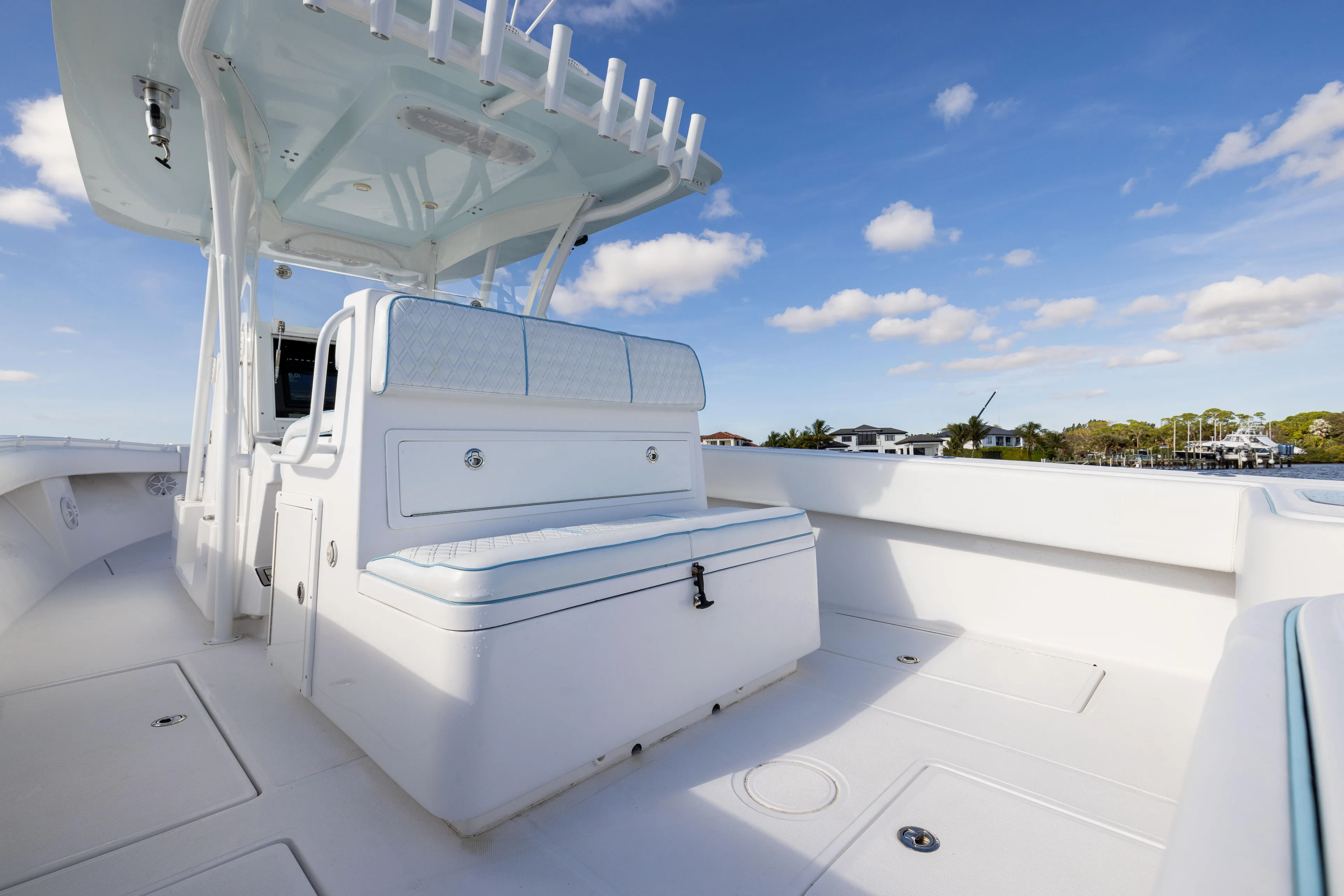 Bloodline Yacht Photos Pics 2018 SeaHunter 33' Center Console boat with spacious deck and seating under blue sky.