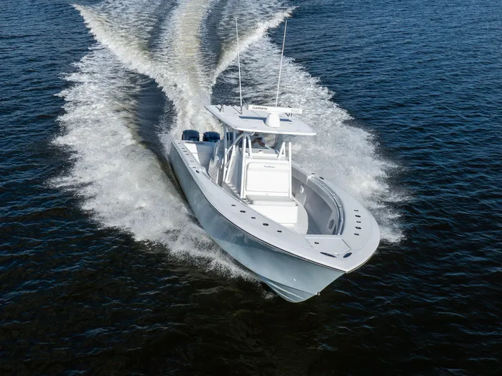 Bloodline Yacht Photos Pics 2018 SeaHunter 33' Center Console boat cruising on open water.
