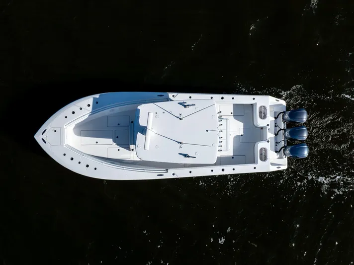 Bloodline Yacht Photos Pics 2018 SeaHunter 33' Center Console boat, aerial view on dark water.