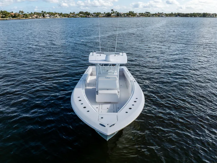 Bloodline Yacht Photos Pics 2018 SeaHunter 33' Center Console boat on calm water, front view.