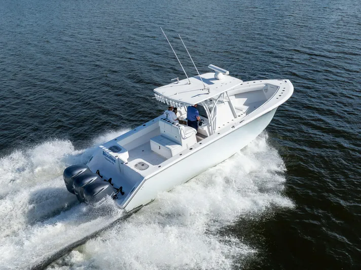 Bloodline Yacht Photos Pics 2018 SeaHunter 33' Center Console boat cruising on open water.