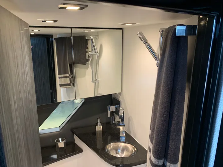  Yacht Photos Pics Luxurious bathroom in Silverton 4100 SC boat, year 2019.