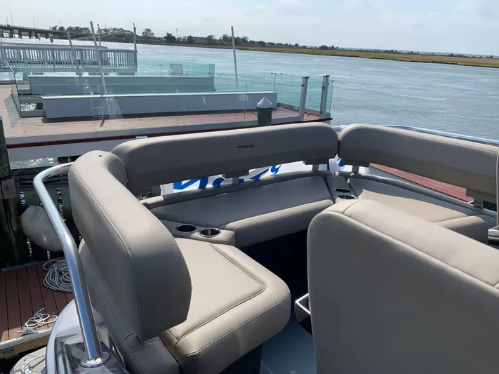  Yacht Photos Pics Interior of 2019 Silverton 4100 SC yacht overlooking the water.