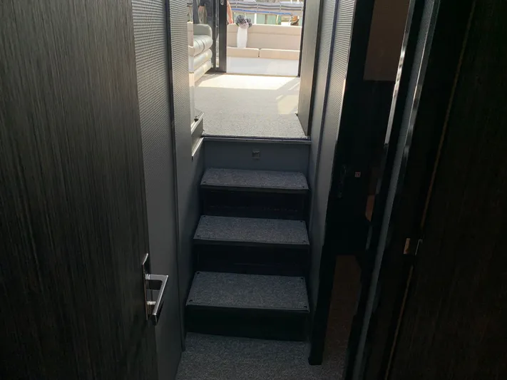  Yacht Photos Pics Interior of Silverton 4100 SC yacht, stairs leading to deck.