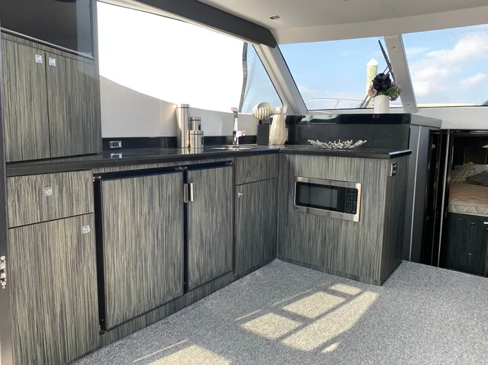  Yacht Photos Pics Interior of Silverton 4100 SC yacht, modern kitchen, 2019 model.