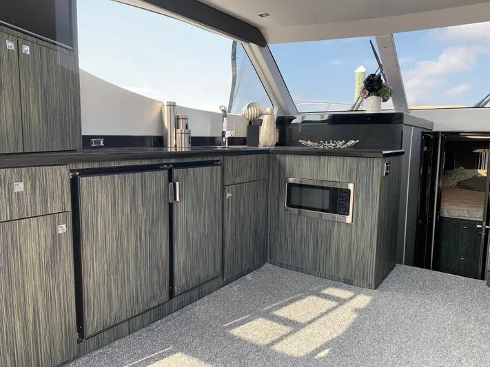  Yacht Photos Pics Interior of Silverton 4100 SC yacht, modern kitchen, 2019 model.