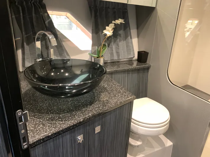  Yacht Photos Pics Luxurious bathroom in Silverton 4100 SC 2019 yacht model.