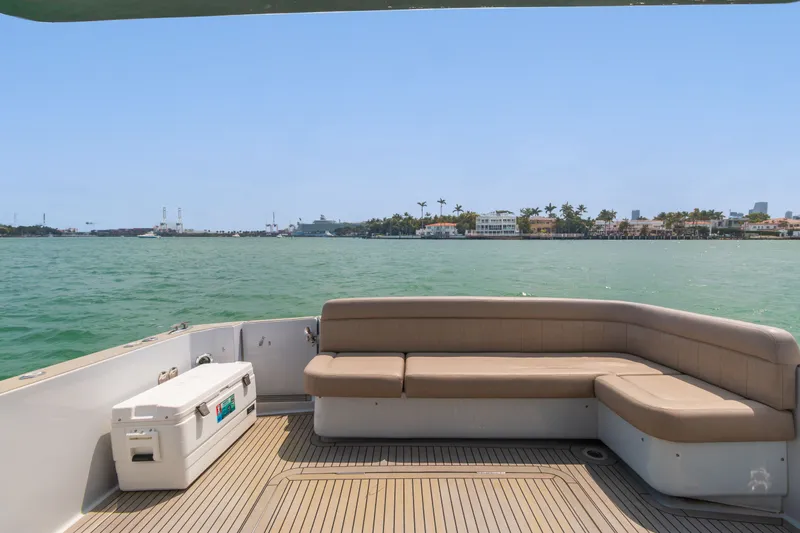  Yacht Photos Pics Seating area on a Silverton 4100 SC yacht, overlooking water, 2019 model.