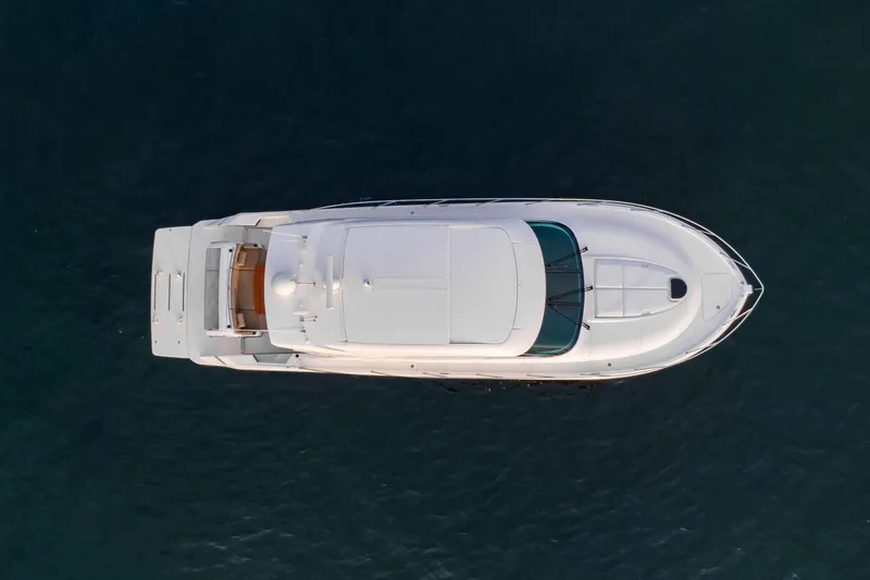 Happy Daze IV Yacht Photos Pics Overhead view of 2017 Tiara Yachts C53 Coupe on water.