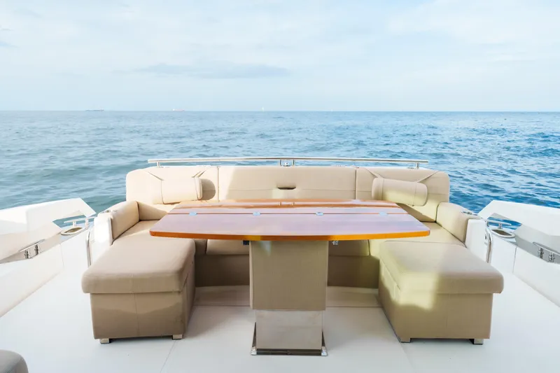 Happy Daze IV Yacht Photos Pics Luxurious seating area on 2017 Tiara Yachts C53 Coupe with ocean view.