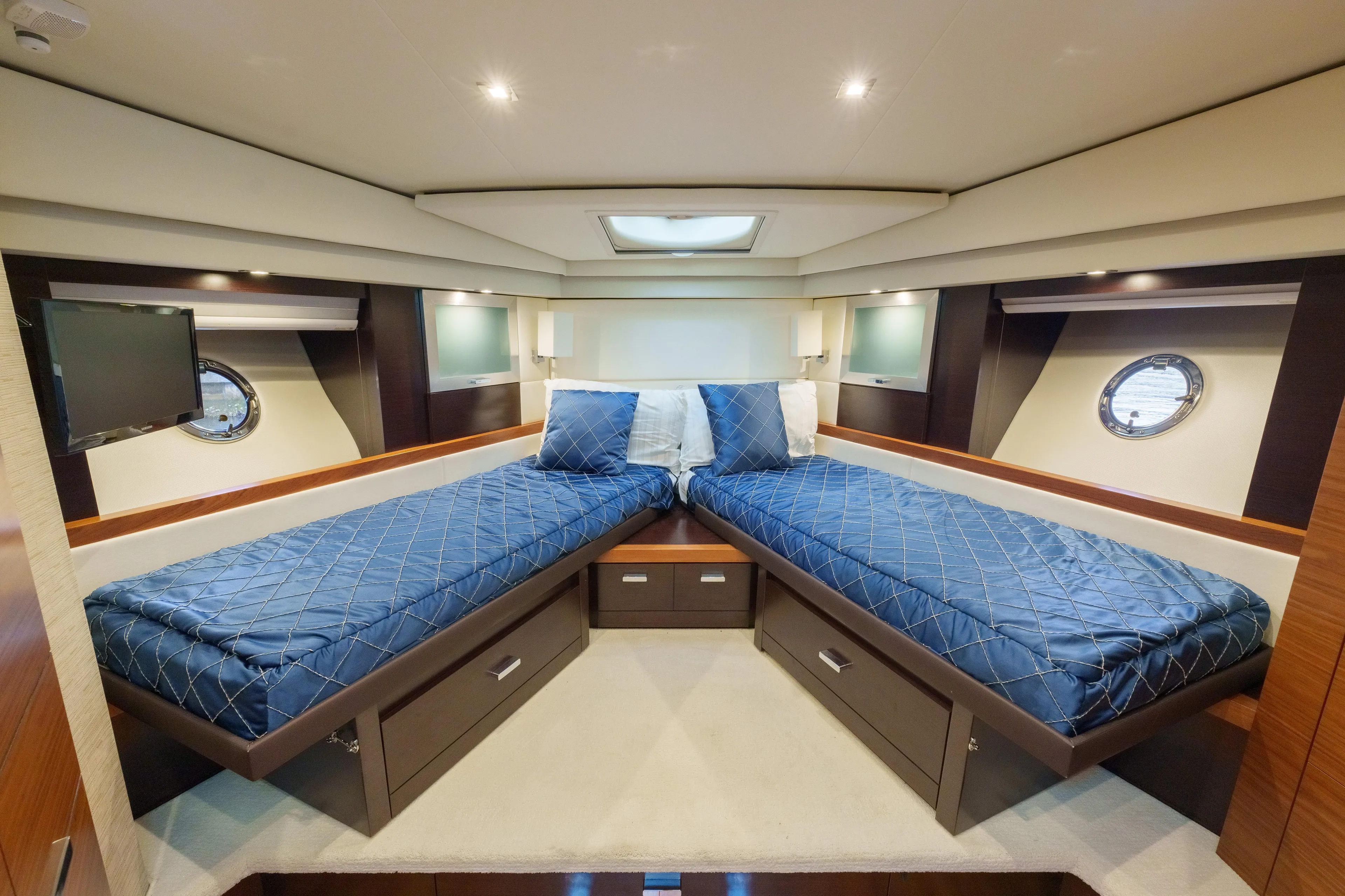 Happy Daze IV Yacht Photos Pics Luxurious 2017 Tiara Yachts C53 Coupe cabin with twin beds and elegant decor.