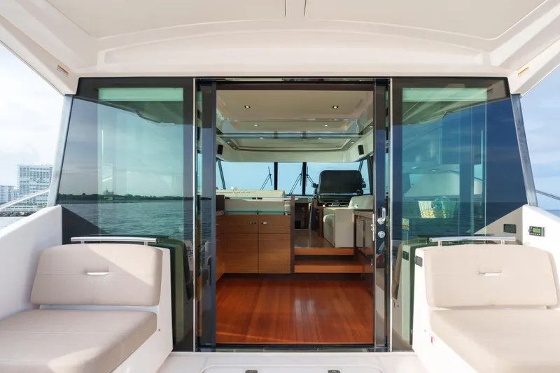 Happy Daze IV Yacht Photos Pics 2017 Tiara Yachts C53 Coupe interior with sleek design and luxurious seating.