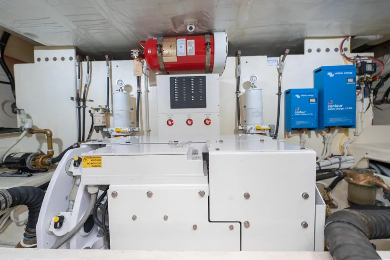 Happy Daze IV Yacht Photos Pics Engine room of 2017 Tiara Yachts C53 Coupe, featuring electrical systems and safety equipment.