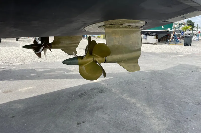 Happy Daze IV Yacht Photos Pics Propellers of a 2017 Tiara Yachts C53 Coupe on dry dock.