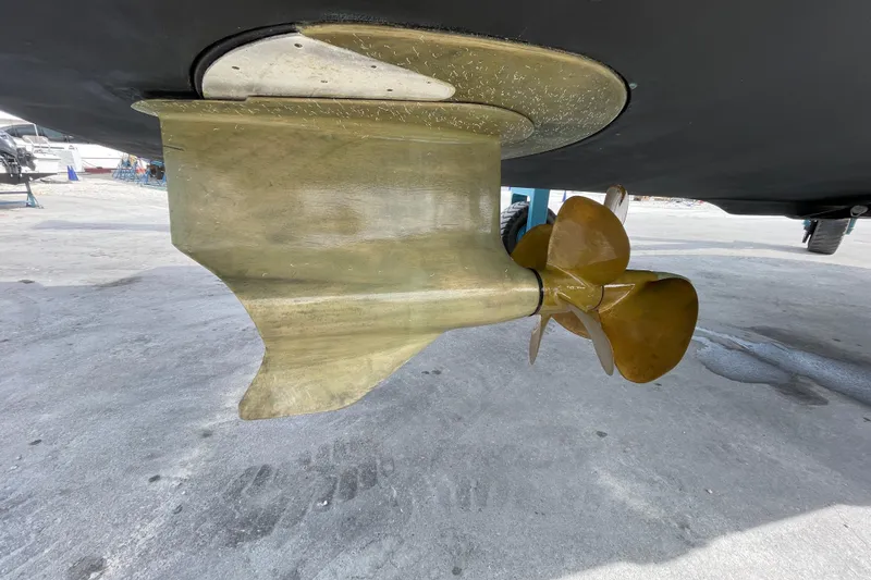 Happy Daze IV Yacht Photos Pics Propeller and rudder of 2017 Tiara Yachts C53 Coupe on dry dock.