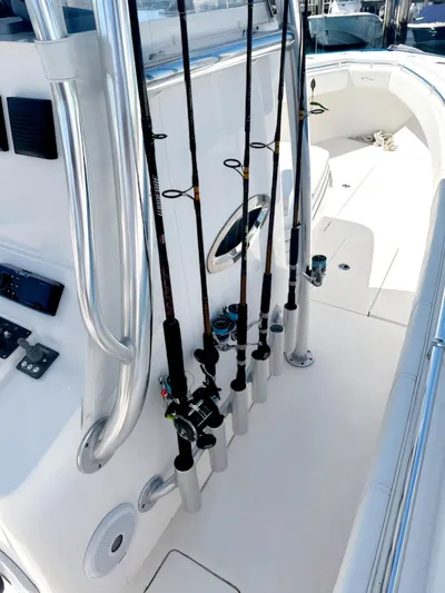 White Cap Yacht Photos Pics 2016 Contender 32 ST boat with fishing rods in holders on deck.