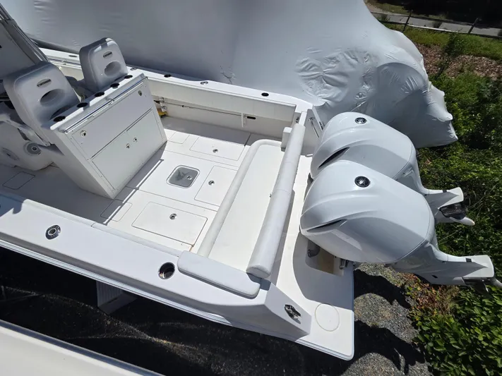 White Cap Yacht Photos Pics 2016 Contender 32 ST boat with dual outboard engines and spacious deck layout.