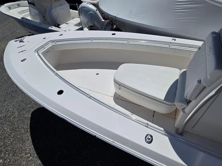 White Cap Yacht Photos Pics 2016 Contender 32 ST boat interior with seating and clean deck design.
