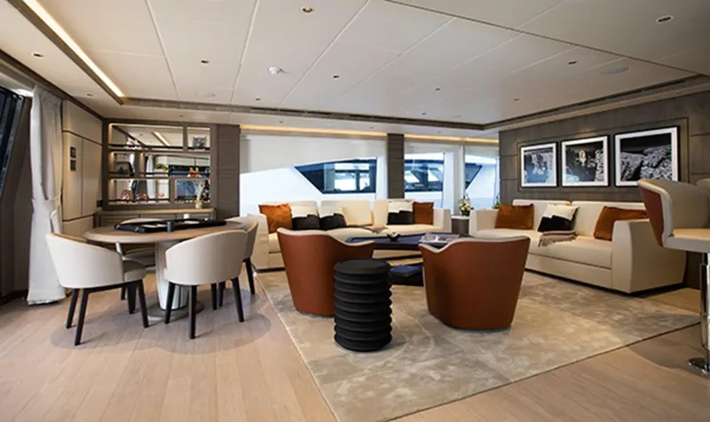 Checked Out Yacht Photos Pics Luxurious 2020 Majesty 140 yacht interior with elegant seating and modern decor.