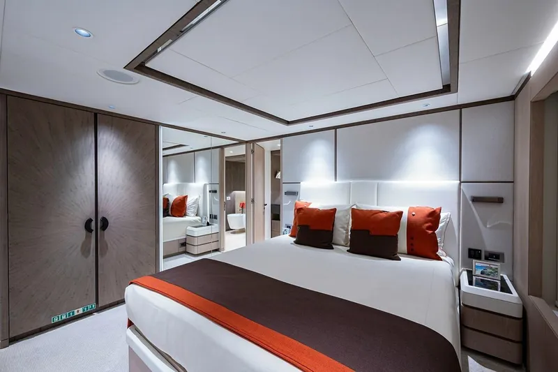 Checked Out Yacht Photos Pics Luxurious bedroom interior on 2020 Majesty 140 yacht with modern design and elegant decor.
