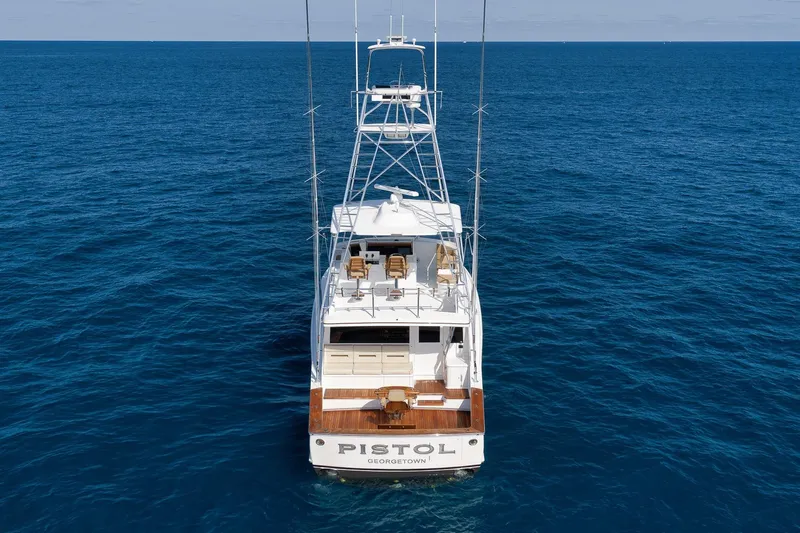 Pistol Yacht Photos Pics Luxury Weaver 60 Convertible yacht, 2002 model, named "Pistol" on open ocean.