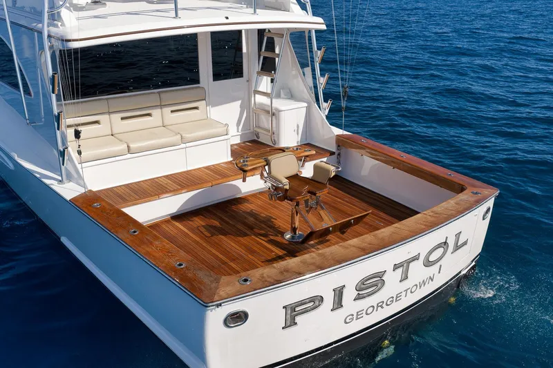 Pistol Yacht Photos Pics Luxury Weaver 60 Convertible yacht, 2002 model, with spacious deck and seating, named "Pistol."