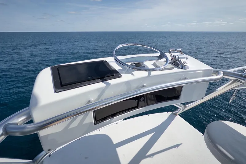 Pistol Yacht Photos Pics Helm of 2002 Weaver 60 Convertible yacht with ocean view.