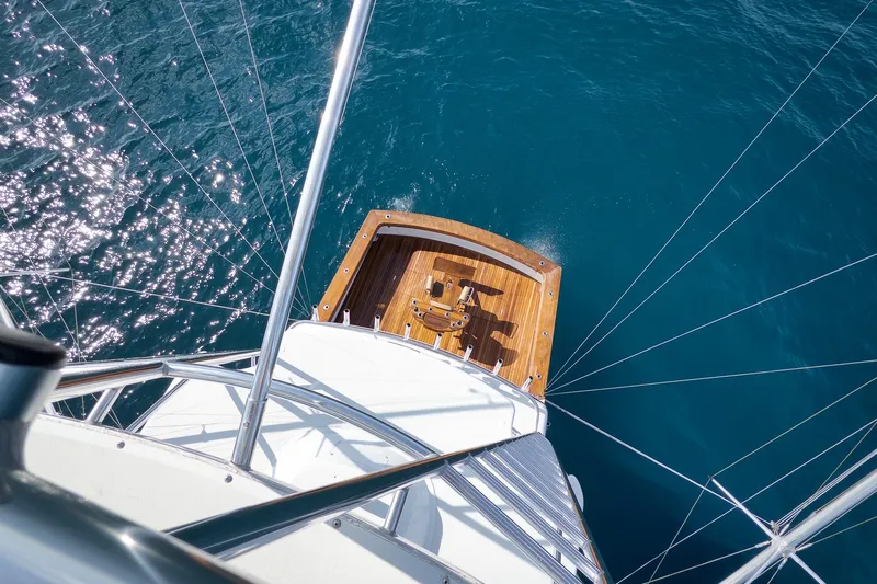 Pistol Yacht Photos Pics Aerial view of 2002 Weaver 60 Convertible yacht on sparkling blue water.