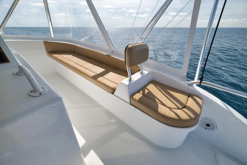 Pistol Yacht Photos Pics Luxurious seating on 2002 Weaver 60 Convertible yacht with ocean view.