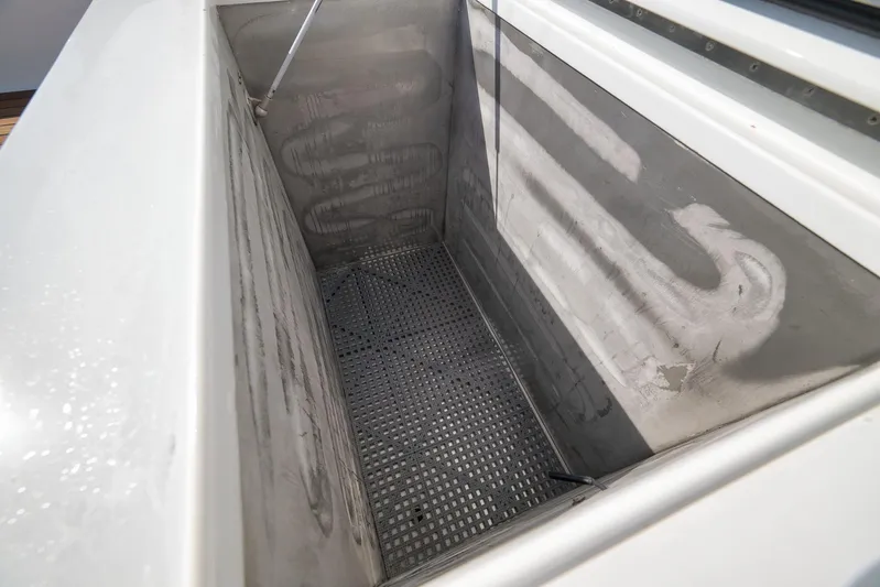 Pistol Yacht Photos Pics Large storage compartment on a 2002 Weaver 60 Convertible boat.