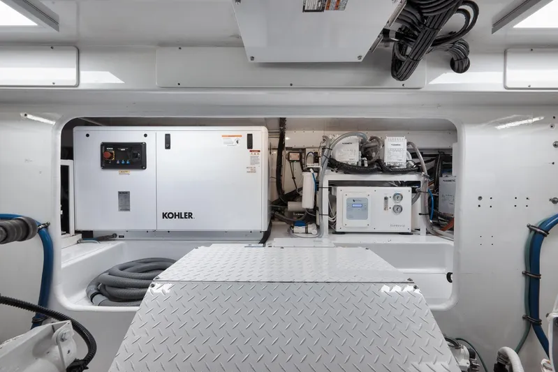 Pistol Yacht Photos Pics Engine room of 2002 Weaver 60 Convertible with Kohler generator and equipment.