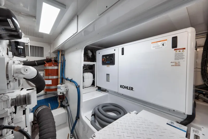 Pistol Yacht Photos Pics Engine room of 2002 Weaver 60 Convertible with Kohler generator and fire extinguisher.