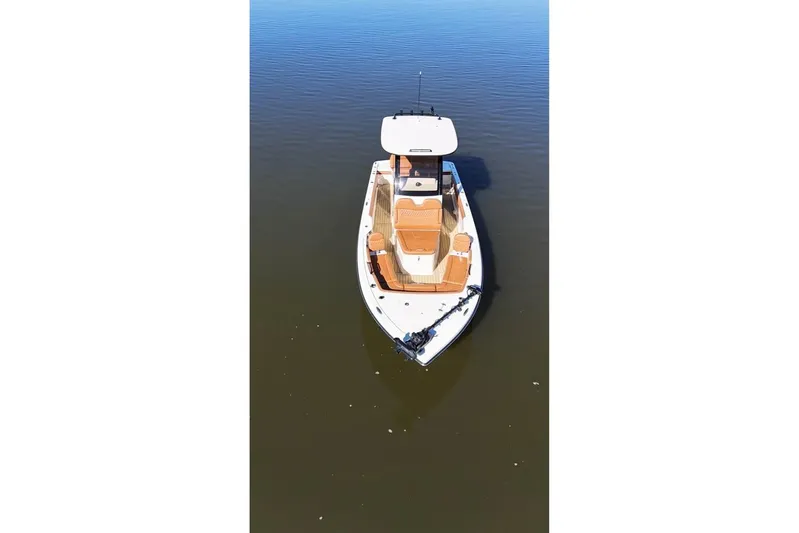 Yacht Photos Pics 2025 Scout 261 XSS boat on calm water, aerial view.