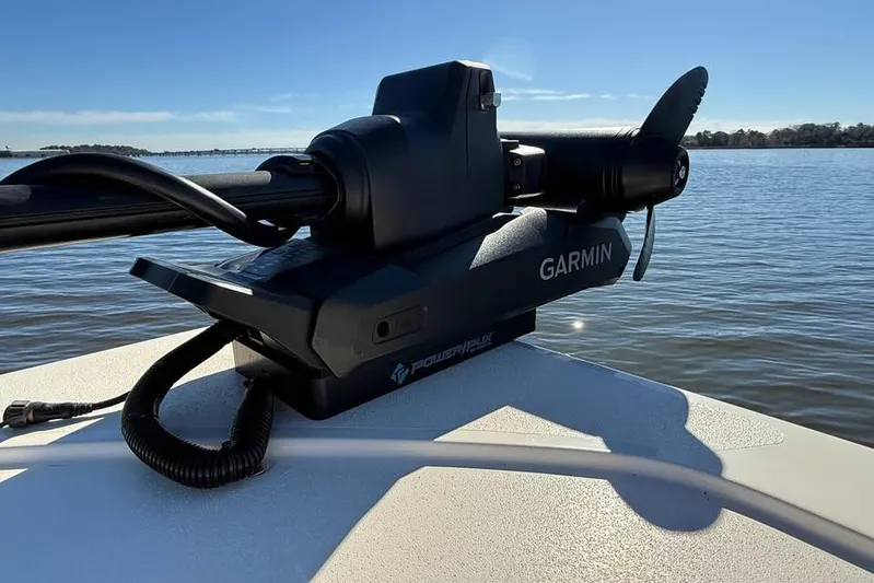  Yacht Photos Pics Garmin marine equipment on 2025 Scout 261 XSS boat, positioned on calm water.