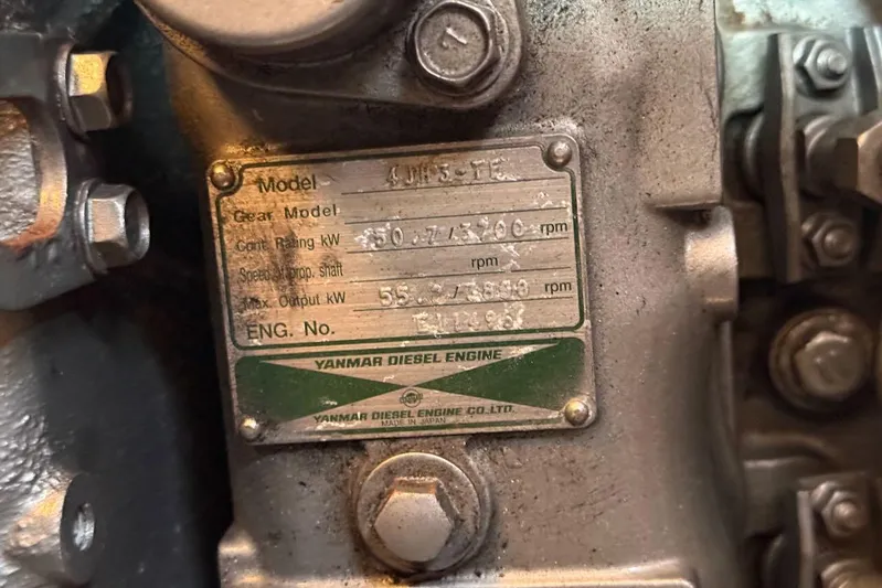 Juniper Yacht Photos Pics Yanmar diesel engine label on Island Packet 420, 2002 model, showing specifications and details.