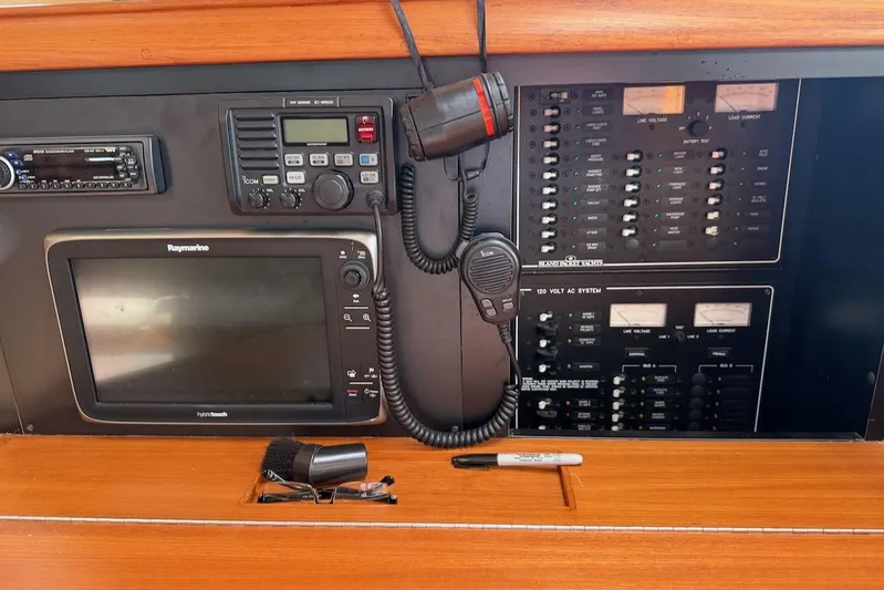 Juniper Yacht Photos Pics Control panel of a 2002 Island Packet 420 yacht with navigation and communication equipment.