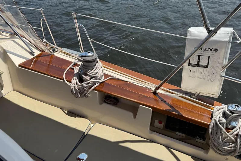 Juniper Yacht Photos Pics Island Packet 420 sailboat deck with winch, ropes, and safety equipment, 2002 model.