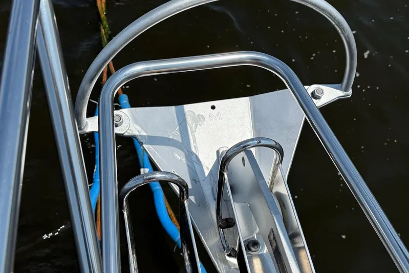 Juniper Yacht Photos Pics Bow of 2002 Island Packet 420 sailboat with anchor and railing.