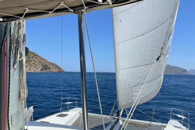 Mojito Yacht Photos Pics Sailing on a 2016 Lagoon 52 F catamaran with scenic ocean and island views.