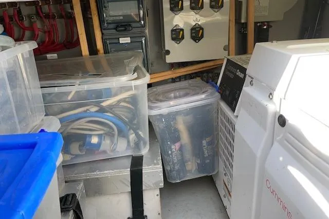 Mojito Yacht Photos Pics Storage area on a 2016 Lagoon 52 F yacht with equipment and containers.