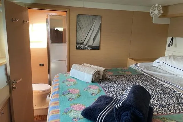 Mojito Yacht Photos Pics Luxurious cabin interior of 2016 Lagoon 52 F yacht with ensuite bathroom.