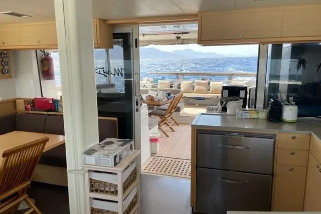 Mojito Yacht Photos Pics Interior of 2016 Lagoon 52 F yacht with kitchen and ocean view.