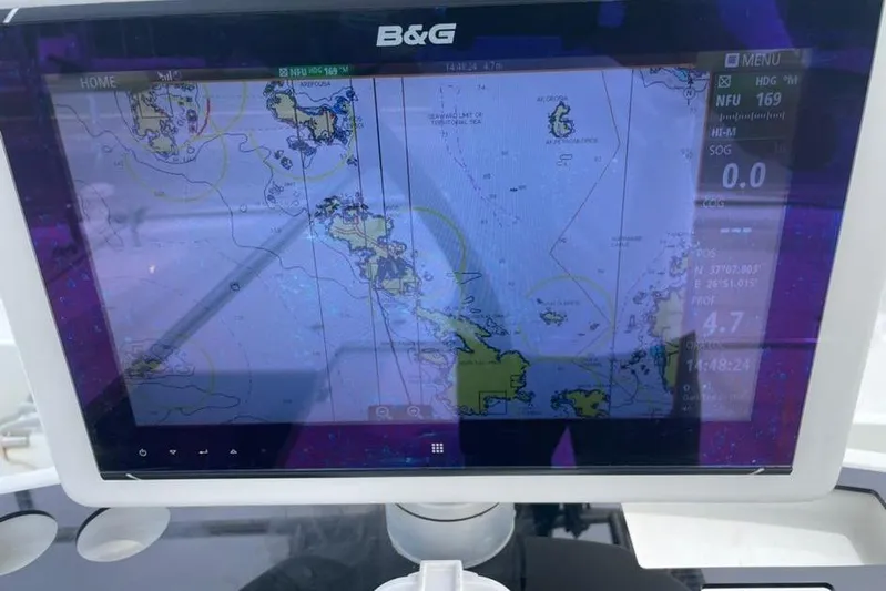 Mojito Yacht Photos Pics Navigation display on a 2016 Lagoon 52 F catamaran, showing nautical charts and coordinates.